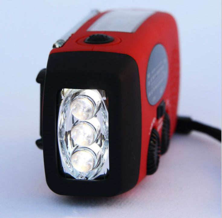 Solar hand crank USB charging radio flashlight - AELYOS