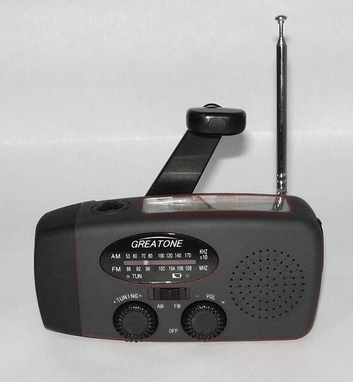 Solar hand crank USB charging radio flashlight - AELYOS